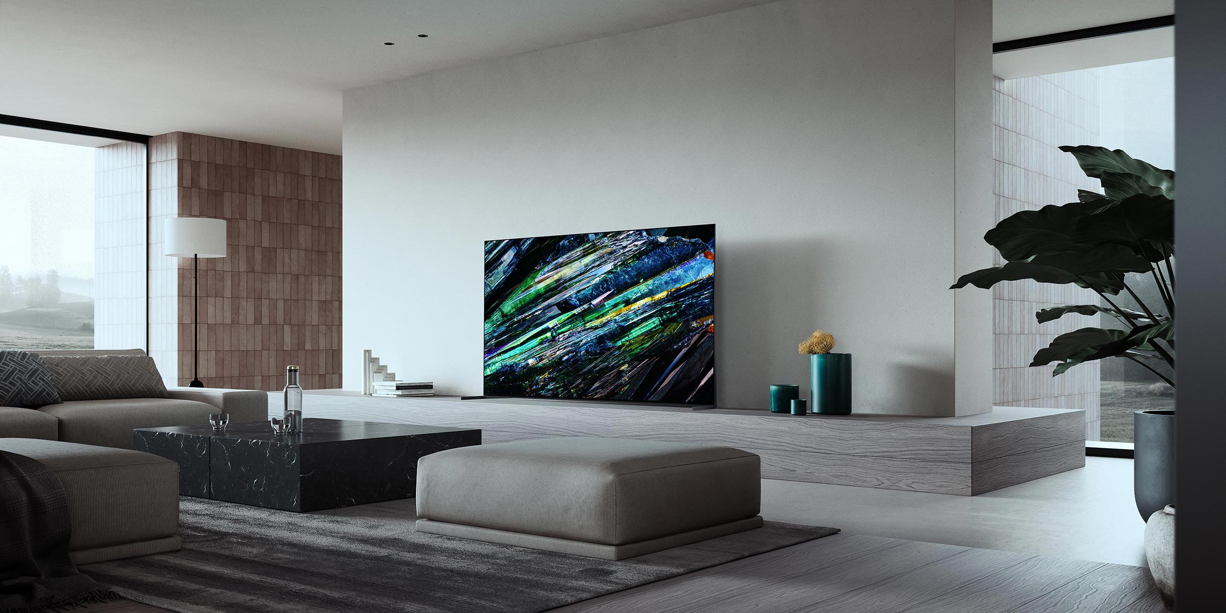 Minimalist living room with a large TV screen showcasing abstract artwork